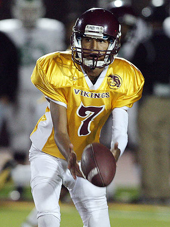 Edison's quarterback Julian Garcia (7)
