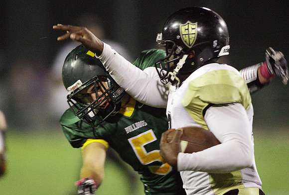 Tracy's Emiliano Aguirre (5) and Chavez's Richard Black (2)