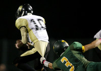 Tracy's Luke Hanna (3) and Chavez's quarterback,  Marcus Sanders (10)